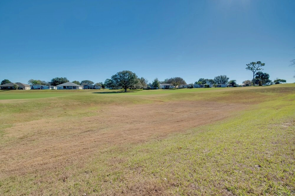 Lady Lake House with Lanai and Community Pool!