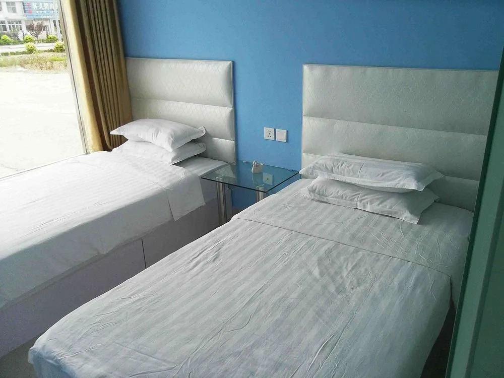 Rongcheng Youdu Express Hotel (Swan Lake Shop)(荣成优度快捷酒店(天鹅湖店）)