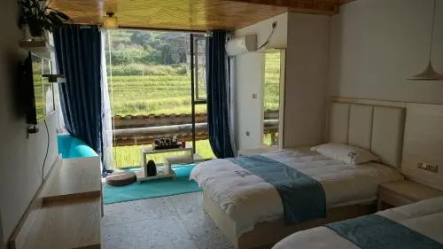 Longsheng Longji Puchuo Shengxiang Art Hotel