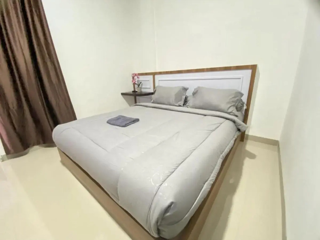 MJ Guest House Pusat Kota Malili Mitra RedDoorz