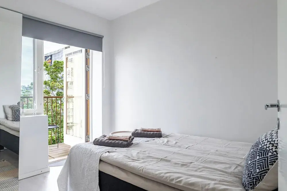 Modern 1BR Home with Sauna & Balcony