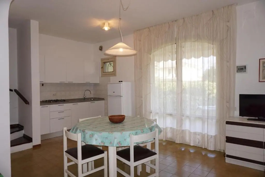 Holiday home with garden and shared pool