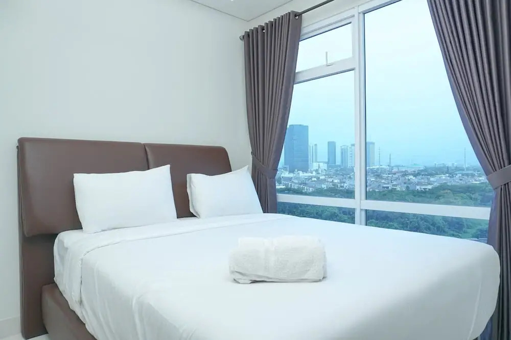 Minimalist 3BR Apartment at Puri Mansion