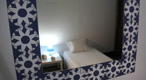 OC Salon Charm Hostel & Suites