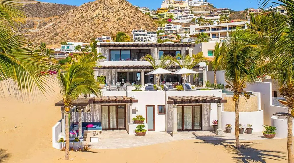 Spectacular 3-Story Beachfront Villa with a Huge Pool Patio