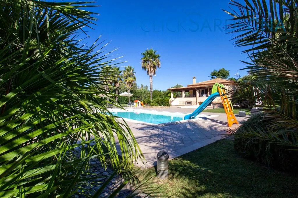 ClickSardegna Villa Paradiso with swimming pool large garden and tennis court