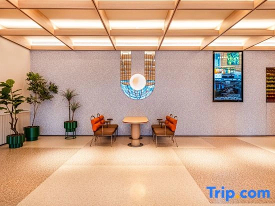 Orange Hotel Yuxi Nie Er Music Plaza