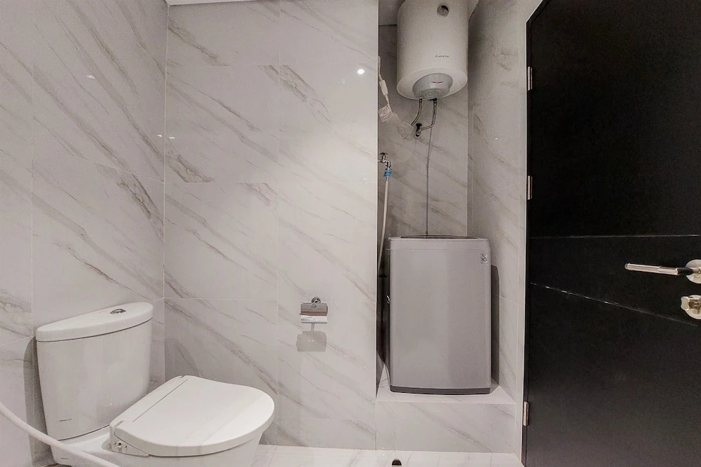 A Luxury 1BR Bali Style Apartment at Branz BSD City