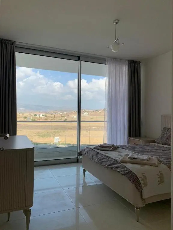 Stunning 2 plus 1 apartment for rent in ABELIA RESIDENCE at Bogaz with beautiful sea and mountains views