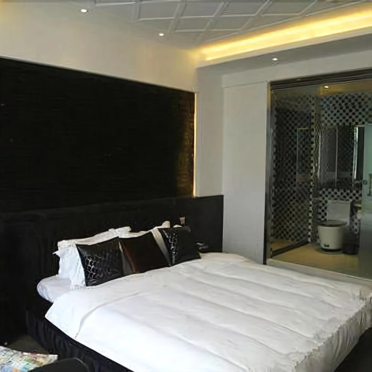 Shijia Boutique Chain Hotel (Kenli Zhongxing Road Store)