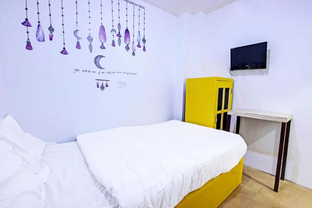 SPOT ON 91506 Guest House Putri Raja