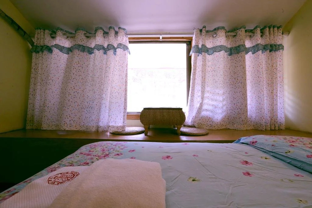 Fenghuang Happy Hotel
