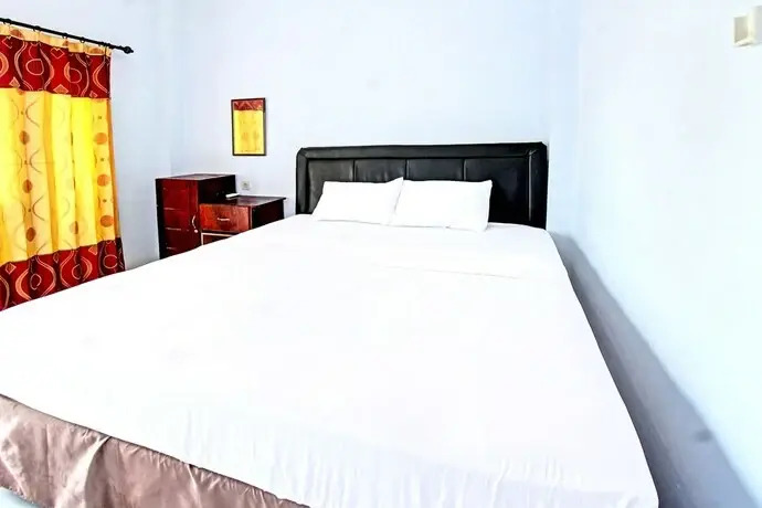 Capital O 92747 Ombak Cafe & Homestay
