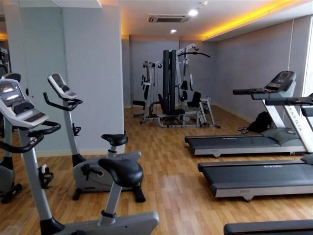 Minimalist 1BR with Pool View at Bassura City Apartment
