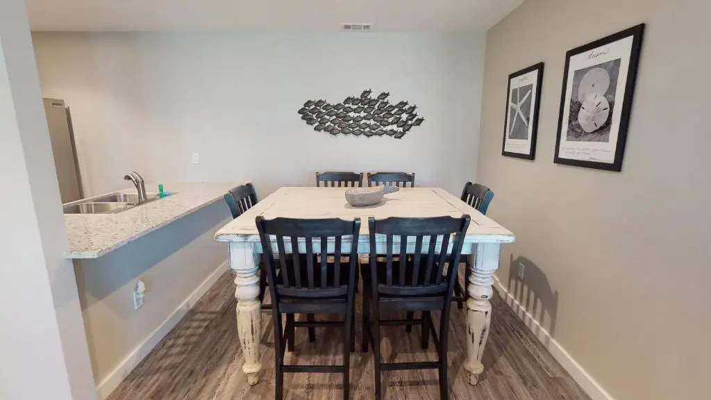 AH-E117 Remodeled First Floor Condo, Across From The Shared Pool & Hot Tub, Near Marina & Ferry
