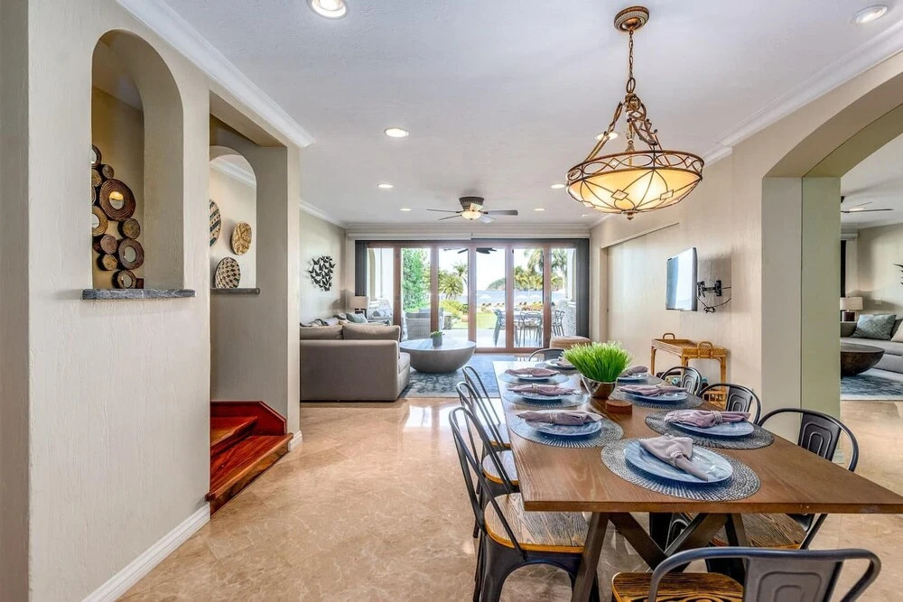 Stylish Split-Level Condo with a Shaded Terrace, Direct Beach Access, and Resort-Style Community Amenities
