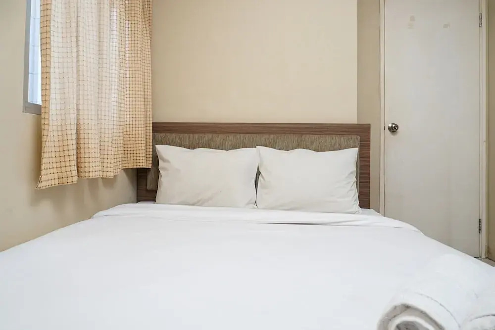 Cozy and Homey 2BR at Kalibata City Apartment