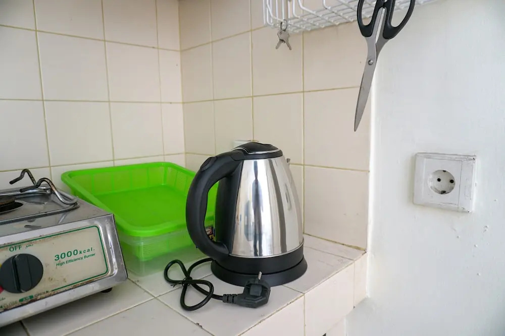 Clean and Homey 1BR at Puri Garden Apartment