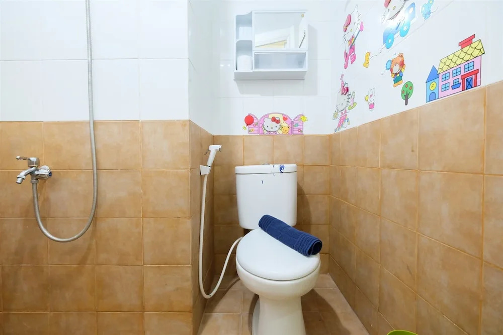 2BR Artistic Room Green Pramuka Apartment closed to Mall By Travelio