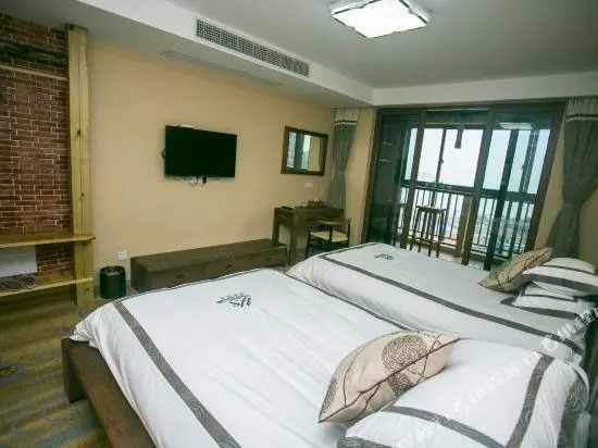 Qingnian Yuesha Holiday Apartment
