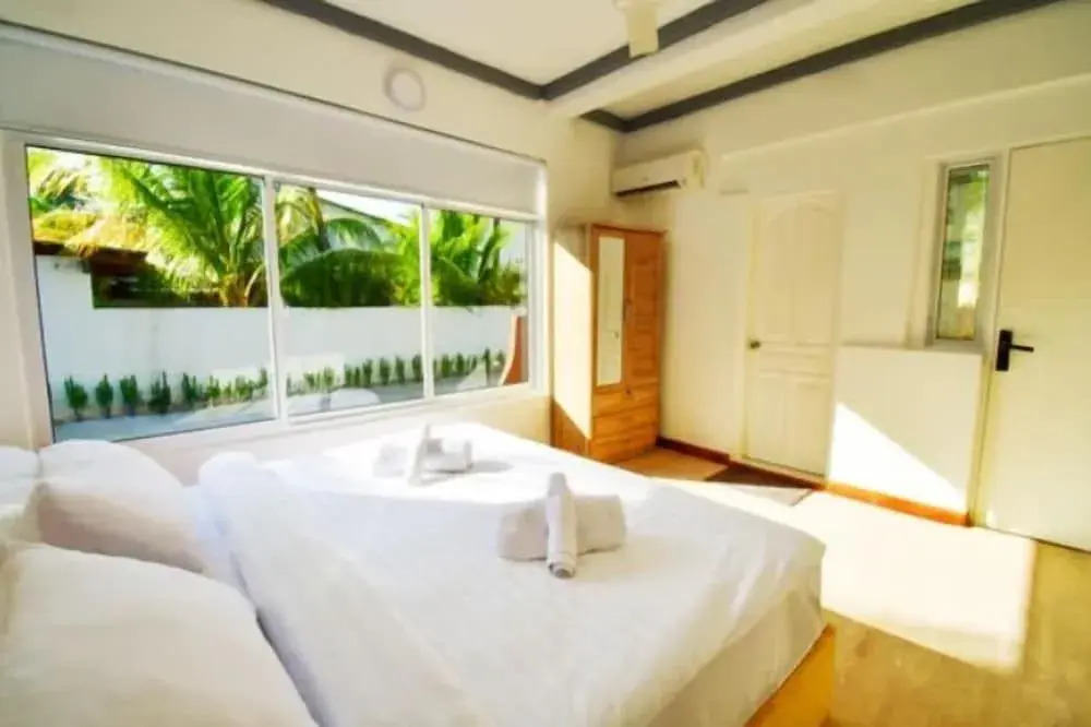 TWIN PALMS Surfhouse