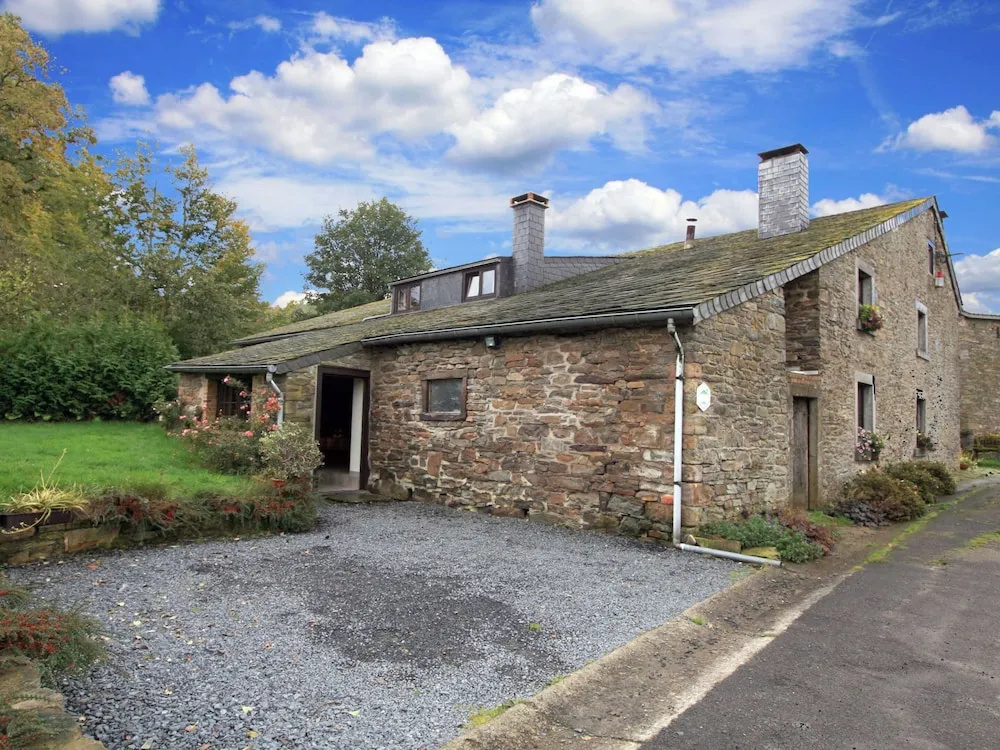 Farmhouse Situated at the Edge of the Woods