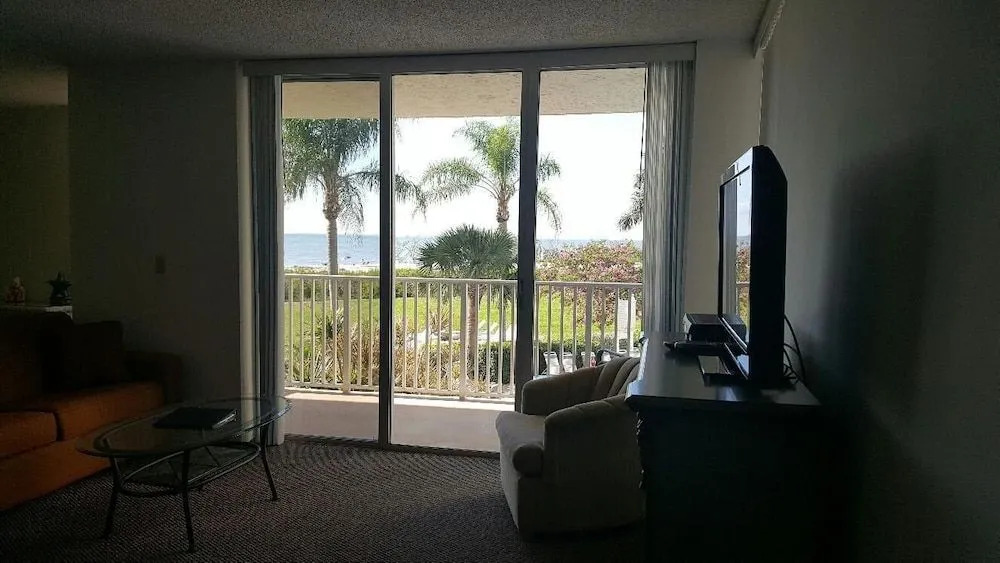 Estero Beach & Tennis #105B by RedAwning