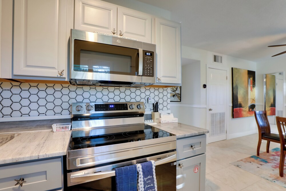 1 Block to John's Pass: Condo w/ Shared Dock!