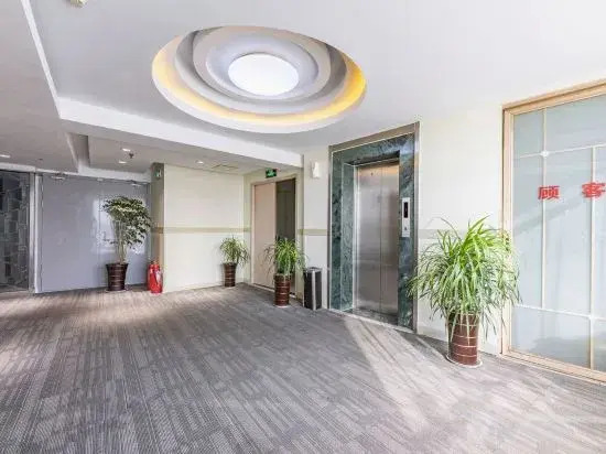 Linyi Mengnuo Hotel (University City bus station store)