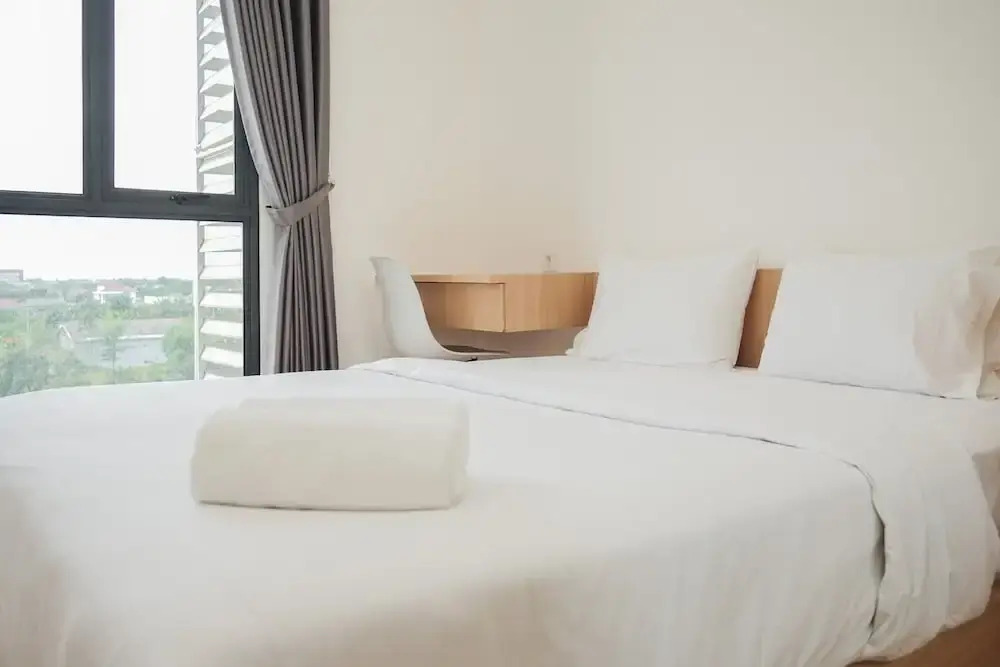 Comfortable Design 2BR with Washing Machine Sky House BSD Apartment By Travelio