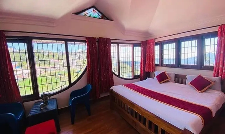 FabHotel Blossom Cottages