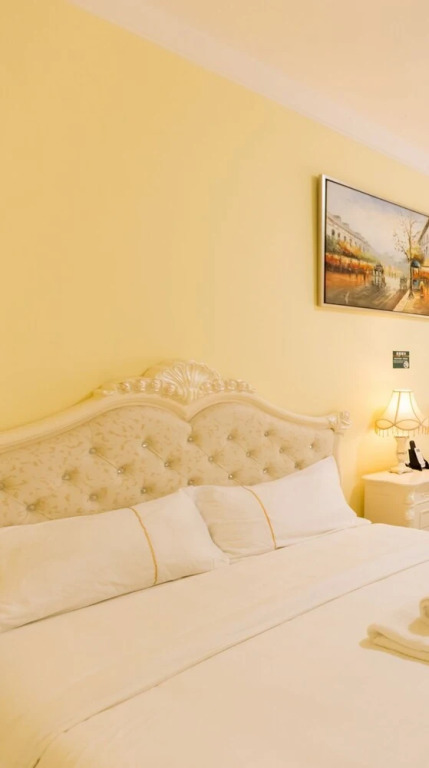 Yumi Apartment Xishuangbaina Branch