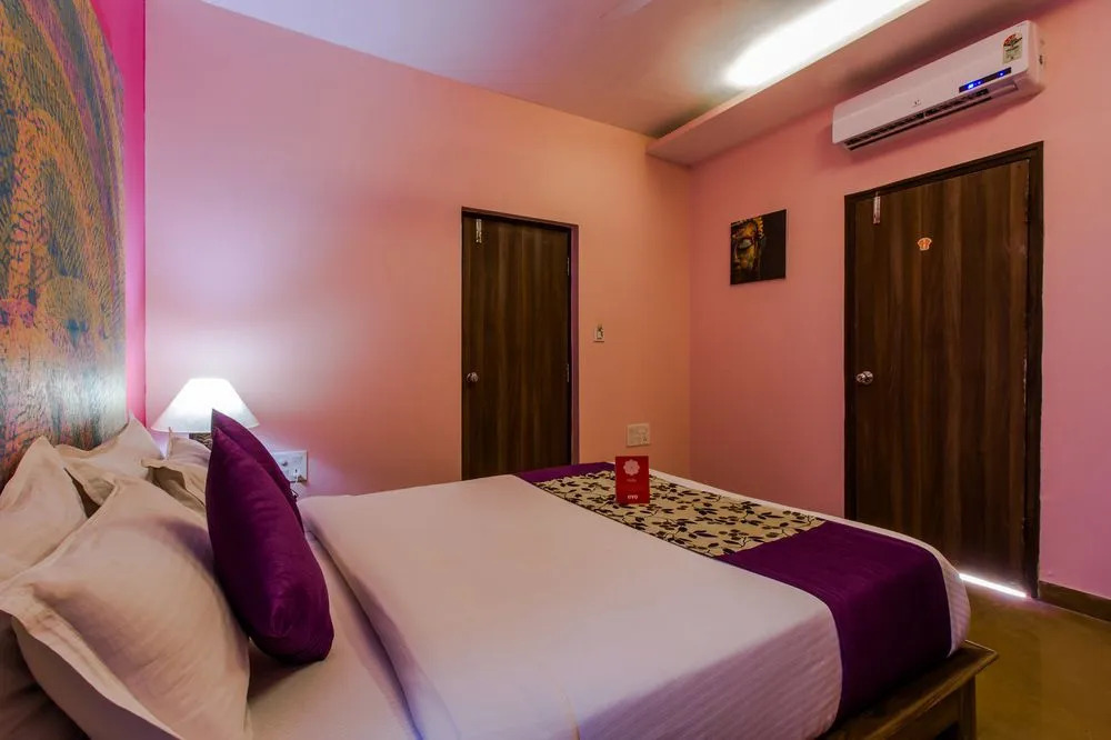 Oyo 5673 Maximum Holiday Inn Rooms