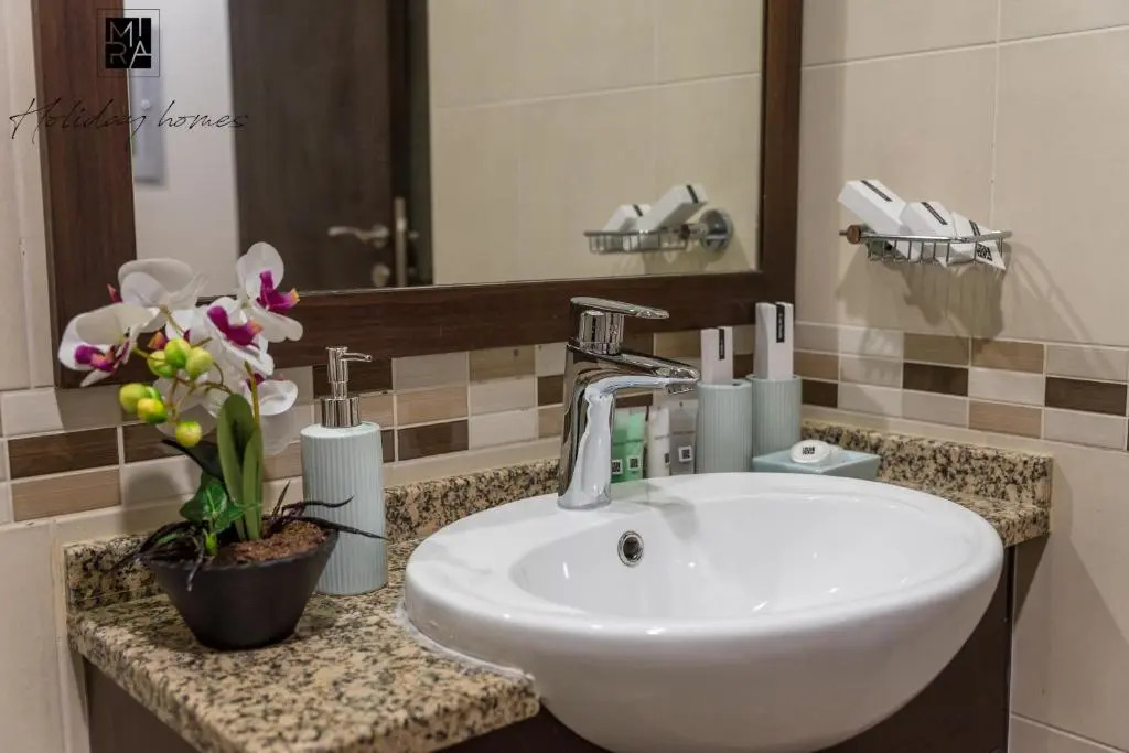 Mira Holiday Homes - Beautiful Studio - WIFI&Pool -7 min to Global Village