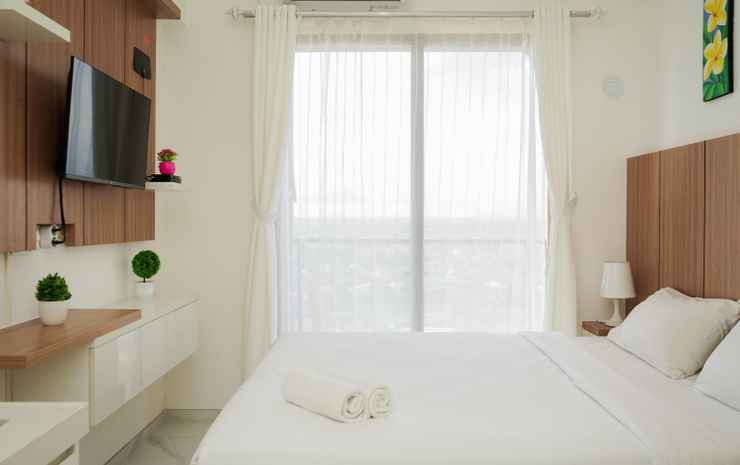 Well Appointed and Homey Studio Room at Sky House BSD Apartment By Travelio
