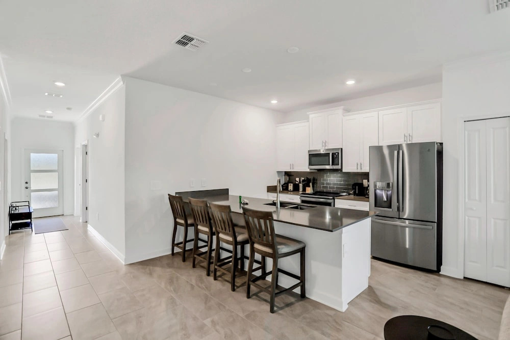 Updated Townhome With an Enclosed Pool, Five Bedrooms, W/D - Close to Everything