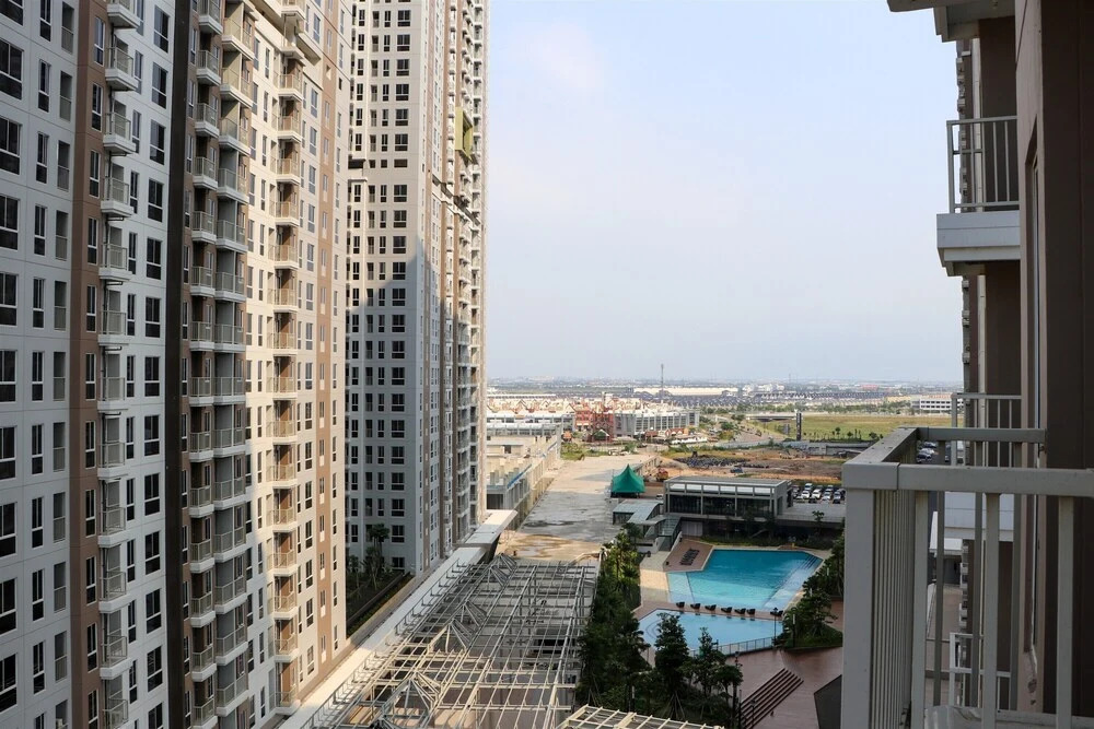 Homey and Good Price Studio at Tokyo Riverside PIK 2 Apartment By Travelio