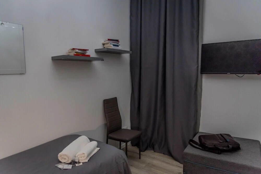 Inside Roma Rooms by DOT Suites