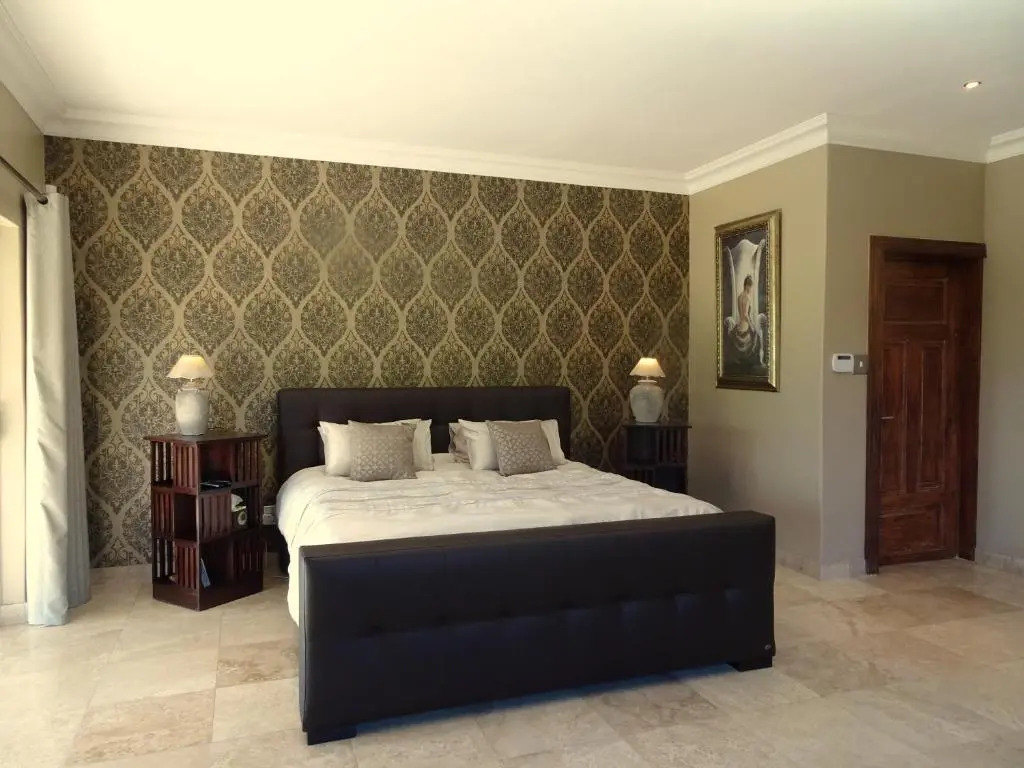 African Palm Cottage and Guesthouse