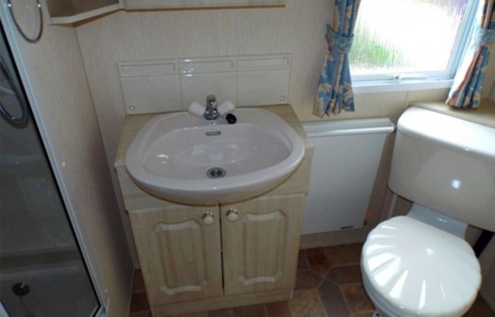 Mobile Home im Ferienpark mit Seezugang