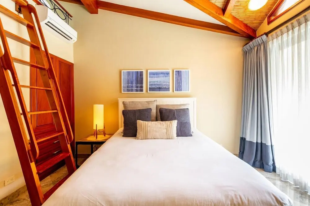 Modern Oceanfront Condo with a Chic Coastal Design, Resort-Style Amenities, and Direct Beach Access