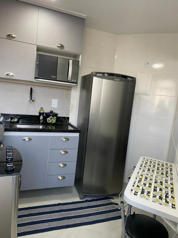Apartamento novo ao lado do Rio Centro!