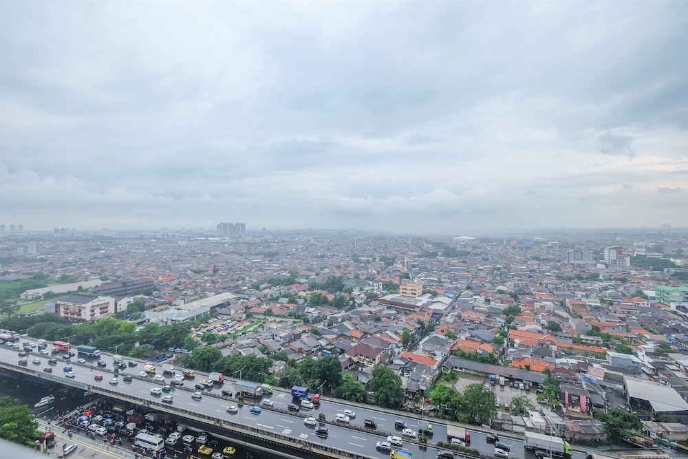 2BR Yotayori Home at Green Pramuka City Apartment By Travelio