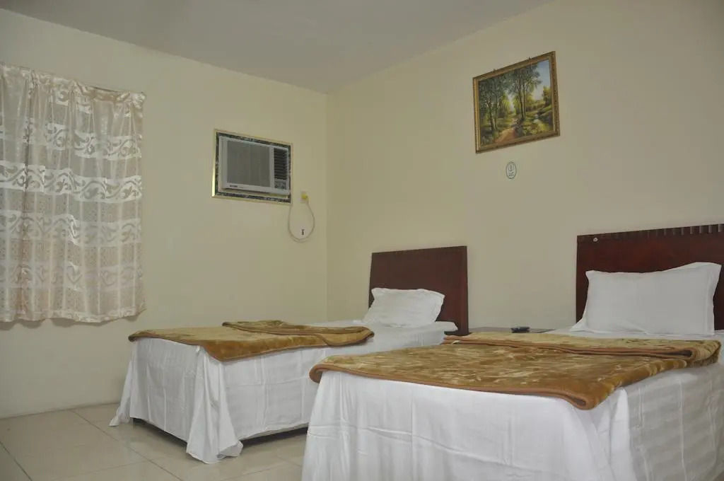 Al Buainain Apartments-Al Madrasah Hotel