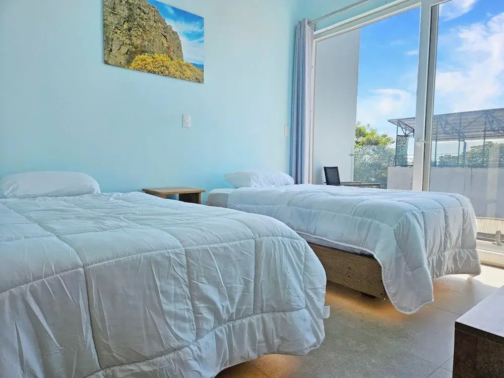 Luxury Villa with rooftop infinity pool and walk away from the beach