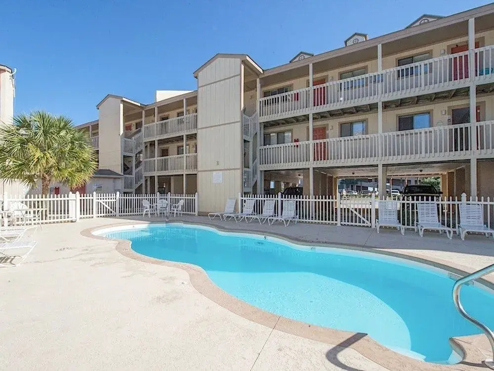 Los Palmas Resort Condo #222 by RedAwning