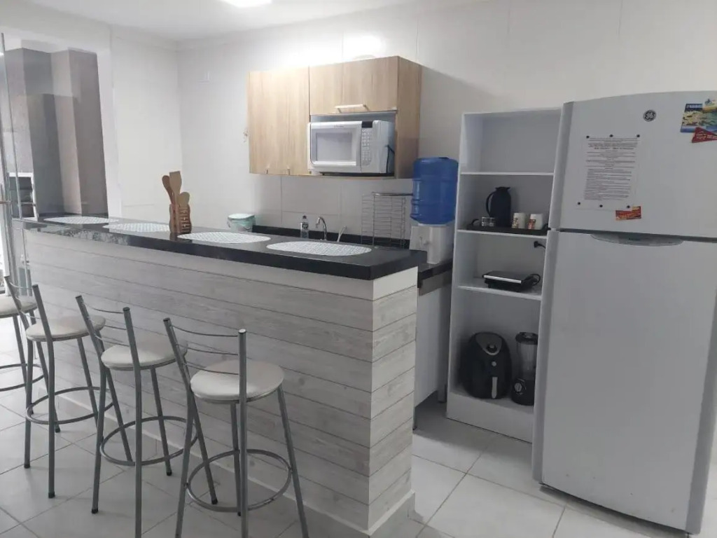 Ubatuba - Apartamento com Churrasqueira e Piscina