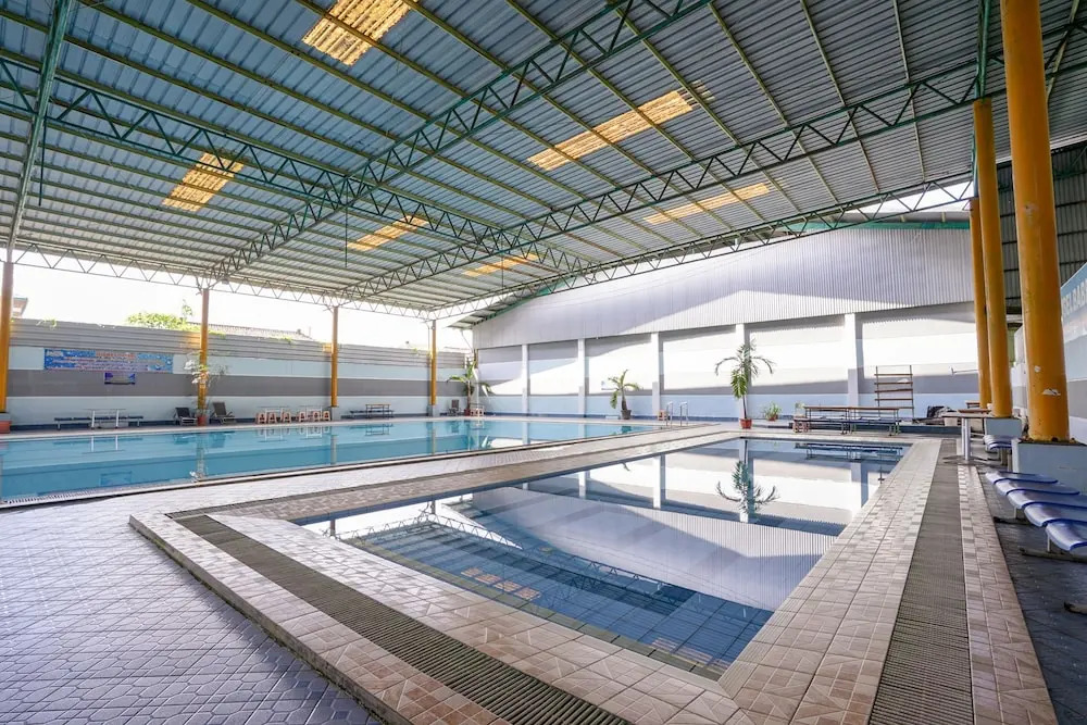 Capital O 2064 Kartika Sriwijaya Hotel