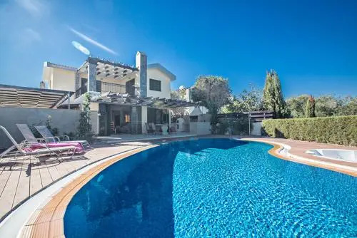 Picture Relaxing Beside Your Private Pool in Protaras Reading Your Favourite Book, Protaras Villa 1320