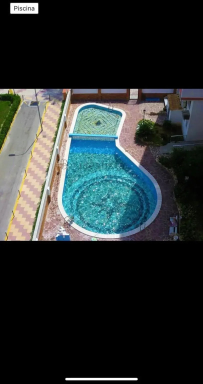 Primera línea en Cullera con piscina. Inmejorables vistas